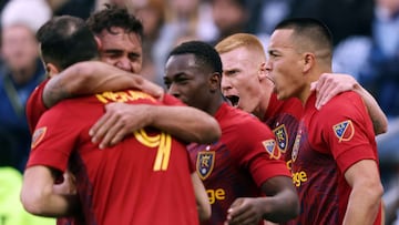 Bobby Wood of Real Salt Lake is congratulated by teammates after scoring in the final minute during the Major League Soccer Playoff game against Sporting Kansas City at Children&#039;s Mercy Park on November 28, 2021. 