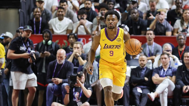 LAS VEGAS, NEVADA - JULY 10: Bronny James #9 of the Los Angeles Lakers brings the ball up the court against the Dallas Mavericks in the first half of a 2025 NBA Summer League game at the Thomas & Mack Center on July 10, 2025 in Las Vegas, Nevada. NOTE TO USER: User expressly acknowledges and agrees that, by downloading and or using this photograph, User is consenting to the terms and conditions of the Getty Images License Agreement. Ethan Miller/Getty Images/AFP (Photo by Ethan Miller / GETTY IMAGES NORTH AMERICA / Getty Images via AFP)