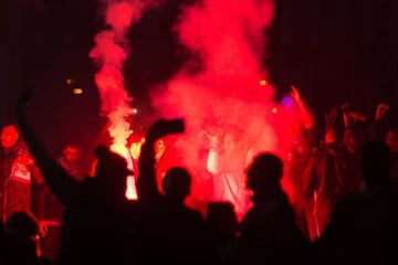 Marseille fans cheer and set off smoke bombs prior to the French L1 football match Olympique de Marseille vs Paris Saint-Germain