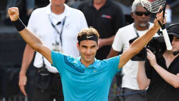 Switzerland's Roger Federer reacts after winning the semi-final match against Australia's Nick Kyrgios at the ATP Mercedes Cup tennis tournament in Stuttgart, southwestern Germany, on June 16, 2018. / AFP PHOTO / THOMAS KIENZLE