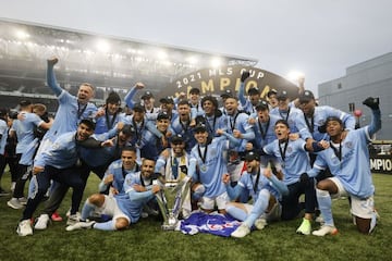 Dec 11, 2021; Portland, OR, USA; Members of the New York City FC celebrate after defeating the Portland Timbers in the 2021 MLS Cup championship game at Providence Park. Mandatory Credit: Jaime Valdez-