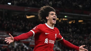 Liverpool's English striker #76 Jayden Danns celebrates after scoring their third goal during the English FA Cup fifth round football match between Liverpool and Southampton at Anfield stadium, in Liverpool, north west England, on February 28, 2024. (Photo by Paul ELLIS / AFP) / RESTRICTED TO EDITORIAL USE. No use with unauthorized audio, video, data, fixture lists, club/league logos or 'live' services. Online in-match use limited to 120 images. An additional 40 images may be used in extra time. No video emulation. Social media in-match use limited to 120 images. An additional 40 images may be used in extra time. No use in betting publications, games or single club/league/player publications. /