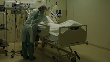 SAO PAULO, BRAZIL - JUNE 18: An intensive care medical staffer, protected by PPE,  tends to a patient infected with COVID-19 at  Municipal Hospital of Parelheiros on June 18, 2021 in Sao Paulo, Brazil.. According to official figures released by the Health