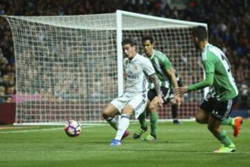 Real Madrid's James Rodriguez, left, challenges Real Betis defenders during a Spanish La Liga soccer match between Real Madrid and Real Betis at the Santiago Bernabeu stadium in Madrid, Sunday, March 12, 2017. Real Madrid won 2-1.