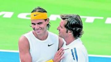 <b>SATISFECHO. </b>Rafa Nadal felicita a Roig tras su triunfo.