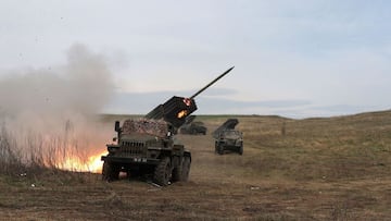 A Ukrainian multiple rocket launcher BM-21 "Grad" shells Russian troops' position, near Lugansk, in the Donbas region, on April 10, 2022. (Photo by Anatolii STEPANOV / AFP)