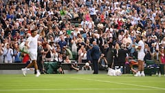 Tennis - Wimbledon - All England Lawn Tennis and Croquet Club, London, Britain - June 28, 2022 Argentina's Francisco Cerundolo exits the court and waves to spectators after losing his first round match against Spain's Rafael Nadal REUTERS/Toby Melville