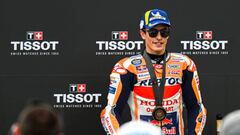 PORTIMAO, ALGARVE, PORTUGAL - MARCH 25: Third-placed Marc Marquez of Spain poses for pictures on the podium after the MotoGP Of Portugal - Sprint Race at Autodromo Internacional do Algarve on March 25, 2023 in Portimao, Algarve, Portugal. (Photo by Octavio Passos/Getty Images)