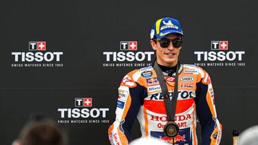 PORTIMAO, ALGARVE, PORTUGAL - MARCH 25: Third-placed Marc Marquez of Spain poses for pictures on the podium after the MotoGP Of Portugal - Sprint Race at Autodromo Internacional do Algarve on March 25, 2023 in Portimao, Algarve, Portugal. (Photo by Octavio Passos/Getty Images)