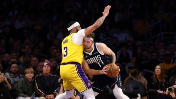 Luka Doncic #77 of the Dallas Mavericks drives to the basket against Anthony Davis #3 of the Los Angeles Lakers during the third quarter at Crypto.com Arena on January 17, 2024 in Los Angeles, California.