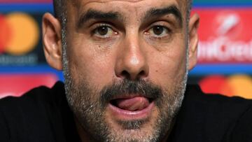 Manchester City's Spanish manager Pep Guardiola gestures as he attends a press conference in Manchester, north west England on October 16, 2017, on the eve of their UEFA Champions League Group F match against Napoli. / AFP PHOTO / Paul ELLIS