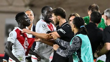 Monaco's Senegalese midfielder #27 Krepin Diatta (L) and Manchester City's Portuguese defender #03 Ruben Dias reacts during the UEFA Champions League, league phase day 2, football match between Monaco and Manchester City at Stade Louis II, in Monaco on October 1, 2025. (Photo by FREDERIC DIDES / AFP)