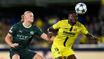 Soccer Football - UEFA Champions League - Villarreal v Manchester City - Estadio de la Ceramica, Villarreal, Spain - October 21, 2025 Villarreal's Thomas Partey in action with Manchester City's Erling Haaland REUTERS/Pablo Morano