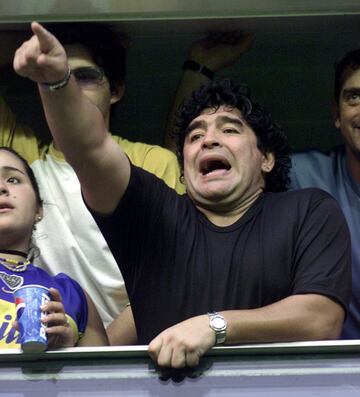 Diego Armando Maradona supporting Boca Juniors at La Bombonera.