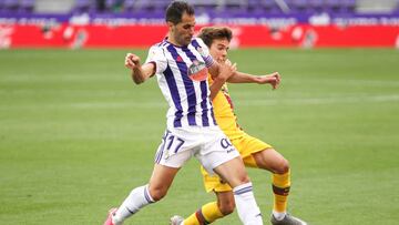 Riqui Puig of FC Barcelona and Javi Moyano of Real Valladolid fight for the ball during the spanish league, La Liga, football match played between Real Valladolid and FC Barcelona at Jose Zorrilla Stadium on July 11, 2020 in Valladolid, Spain.
11/07/