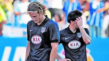 Forlán cabizbajo durante el encuentro