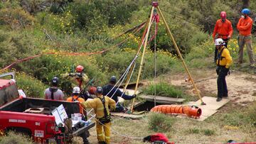 Members of a rescue team work at a site where three bodies were found in the state of Baja California where one American and two Australian tourists were reported missing, in La Bocana, Mexico May 3, 2024. REUTERS/Francisco Javier Cruz