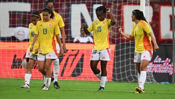 Colombia's Linda Caicedo (C) celebrates after scoring against Venezuela during the women's friendly football match between Venezuela and Colombia at the Metropolitano stadium in Barquisimeto, Venezuela on May 30, 2024. (Photo by Federico PARRA / AFP)