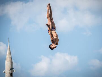 MOSTAR, BOSNIA AND HERZEGOVINA  - AUGUST 22: (EDITORIAL USE ONLY) In this handout image provided by Red Bull, Jonathan Paredes of Mexico dives from the 27 metre platform on Stari Most during the first training session of the sixth stop of the Red Bull Cli