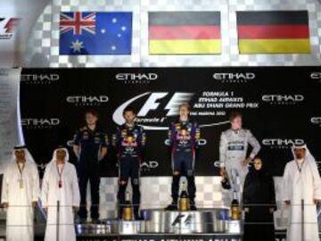 Mark Webber, Sebastian Vettel y Nico Rosberg en el podio de Abu Dhabi.