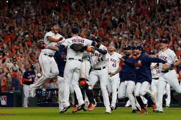 Oct 22, 2021; Houston, Texas, USA; Houston Astros relief pitcher Ryan Pressly (55) celebrates with teammates after defeating the Boston Red Sox to advance to the World Series after winning game six of the 2021 ALCS at Minute Maid Park. Mandatory Credit: T