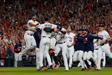 Oct 22, 2021; Houston, Texas, USA; Houston Astros relief pitcher Ryan Pressly (55) celebrates with teammates after defeating the Boston Red Sox to advance to the World Series after winning game six of the 2021 ALCS at Minute Maid Park. Mandatory Credit: T