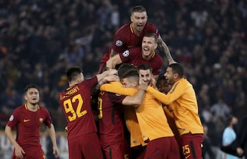 Aleksandar Kolarov, Edin Dzeko of AS Roma and teammates celebrate the qualification for the semis following the UEFA Champions League Quarter Final second leg match between AS Roma and FC Barcelona (Barca) at Stadio Olimpico on April 10, 2018 in Rome, Italy.