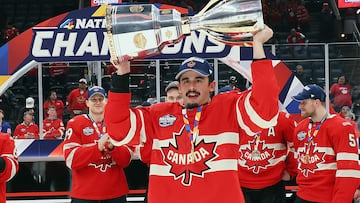 BOSTON, MASSACHUSETTS - FEBRUARY 20: Seth Jarvis #24 of Team Canada celebrates with his teammates after defeating Team United States in overtime to win the NHL 4 Nations Face-Off Championship Game at TD Garden on February 20, 2025 in Boston, Massachusetts. Bruce Bennett/Getty Images/AFP (Photo by BRUCE BENNETT / GETTY IMAGES NORTH AMERICA / Getty Images via AFP)