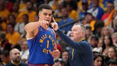 Jun 1, 2023; Denver, CO, USA; Denver Nuggets forward Michael Porter Jr. (1) talks with head coach Michael Malone against the Miami Heat during the third quarter in game one of the 2023 NBA Finals at Ball Arena. Mandatory Credit: Kyle Terada-USA TODAY Sports