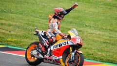Spanish Honda rider Marc Marquez celebrates winning the MotoGP competition of the Moto Grand Prix of Germany at the Sachsenring Circuit on July 2, 2017 in Hohenstein-Ernstthal, eastern Germany.  / AFP PHOTO / ROBERT MICHAEL