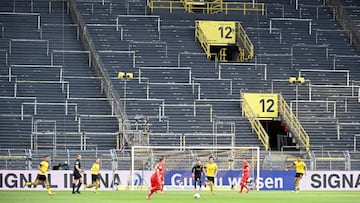 DORTMUND, GERMANY - MAY 26: Empty seats are seen inside the stadium during the Bundesliga match between Borussia Dortmund and FC Bayern Muenchen at Signal Iduna Park on May 26, 2020 in Dortmund, Germany. (Photo by Federico Gambarini/Pool via Getty Images)