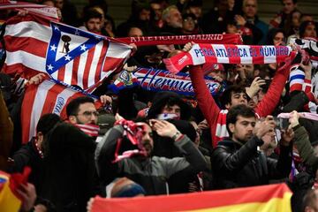 Atletico Madrid's supporters wave flags before the UEFA Champions league Round of 16 second leg football match between Liverpool and Atletico Madrid at Anfield in Liverpool, north west England on March 11, 2020. (Photo by JAVIER SORIANO / AFP) AFICIONADOS