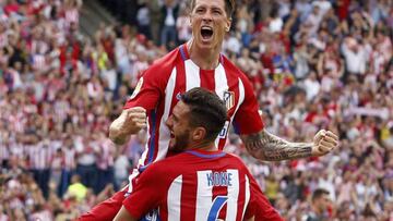 Torres y Koke celebran un gol.