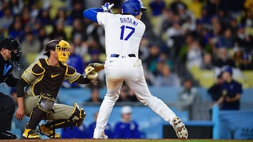 Apr 13, 2024; Los Angeles, California, USA; Los Angeles Dodgers designated hitter Shohei Ohtani (17) hits against the San Diego Padres during the fourth inning at Dodger Stadium. Mandatory Credit: Gary A. Vasquez-USA TODAY Sports
