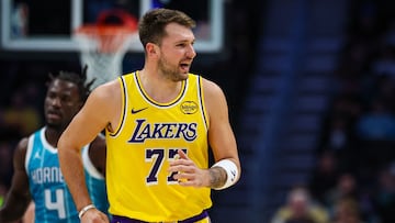 CHARLOTTE, NORTH CAROLINA - NOVEMBER 10: Luka Doncic #77 of the Los Angeles Lakers reacts during the first half of the basketball game against the Charlotte Hornets at Spectrum Center on November 10, 2025 in Charlotte, North Carolina. NOTE TO USER: User expressly acknowledges and agrees that, by downloading and or using this photograph, User is consenting to the terms and conditions of the Getty Images License Agreement. David Jensen/Getty Images/AFP (Photo by David Jensen / GETTY IMAGES NORTH AMERICA / Getty Images via AFP)