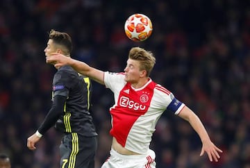 Ajax's Matthijs de Ligt in action with Juventus' Cristiano Ronaldo.