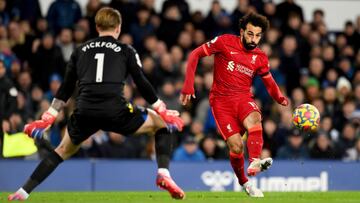 LIVERPOOL, ENGLAND - DECEMBER 01: (THE SUN OUT, THE SUN ON SUNDAY OUT) Mohamed Salah of Liverpool scoring the second goal making the score 0-2 during the Premier League match between Everton  and  Liverpool at Goodison Park on December 01, 2021 in Liverpo