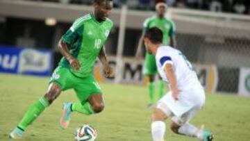 Obi Mikel y Dean Furman