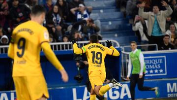 Barcelona's Brazilian forward #19 Vitor Roque celebrates scoring his team's third goal during the Spanish league football match between Deportivo Alaves and FC Barcelona at the Mendizorroza stadium in Vitoria on February 3, 2024. (Photo by Ander Gillenea / AFP)