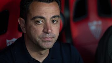 Barcelona's Spanish coach Xavi Hernandez is pictured prior to the Spanish league football match between Sevilla FC and FC Barcelona at the Ramon Sanchez Pizjuan stadium in Seville on May 26, 2024. (Photo by JORGE GUERRERO / AFP)