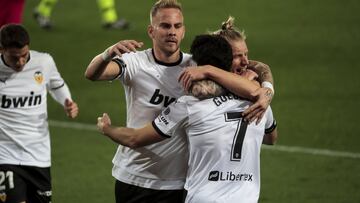 Daniel Wass of Valencia CF celebrate after scoring the 1-0 goal with his teammate during Spanish La Liga match between Valencia cf and Elche FC at Mestalla stadium. In Valencia on January 30, 2021.
