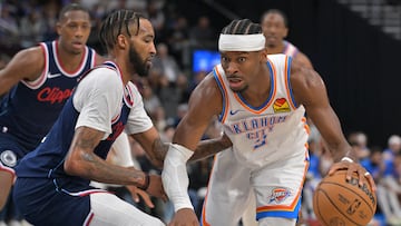 Apr 8, 2026; Inglewood, California, USA; Oklahoma City Thunder guard Shai Gilgeous-Alexander (2) is defended by Los Angeles Clippers forward Derrick Jones Jr. (5) in the second half at Intuit Dome. Mandatory Credit: Jayne Kamin-Oncea-Imagn Images