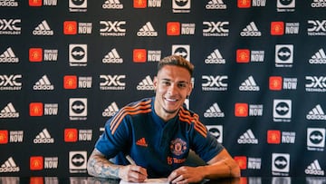 MANCHESTER, ENGLAND - SEPTEMBER 01: New Manchester United signing Antony signs for the club at Carrington Training Ground on September 01, 2022 in Manchester, England. (Photo by Manchester United/Manchester United via Getty Images)