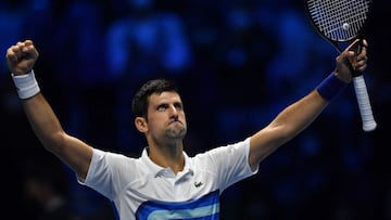 Serbia&#039;s Novak Djokovic celebrates after defeating Russia&#039;s Andrey Rublev during their first round singles match of the ATP Finals at the Pala Alpitour venue in Turin on November 17, 2021. (Photo by Marco BERTORELLO / AFP)