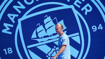 New Manchester City signing, Erling Haaland (centre) during a presentation of new signings at Etihad Stadium, Manchester. Picture date: Sunday July 10, 2022. (Photo by Martin Rickett/PA Images via Getty Images)
