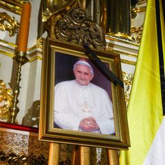 Why did Pope Benedict XVI wear red shoes? What do they symbolize?