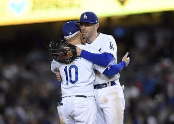 Freddie Freeman #5 of the Los Angeles Dodgers celebrates with Justin Turner #10.