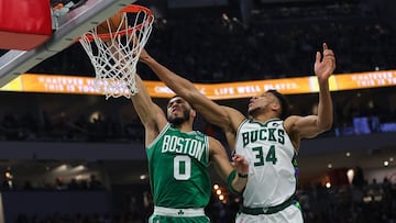 MILWAUKEE, WISCONSIN - MAY 07: Jayson Tatum #0 of the Boston Celtics is fouled by Giannis Antetokounmpo #34 of the Milwaukee Bucks during the second quarter of Game Three of the Eastern Conference Semifinals at Fiserv Forum on May 07, 2022 in Milwaukee, Wisconsin. NOTE TO USER: User expressly acknowledges and agrees that, by downloading and or using this photograph, User is consenting to the terms and conditions of the Getty Images License Agreement.   Stacy Revere/Getty Images/AFP
 == FOR NEWSPAPERS, INTERNET, TELCOS &amp; TELEVISION USE ONLY ==