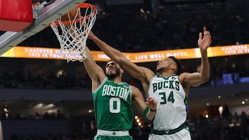 MILWAUKEE, WISCONSIN - MAY 07: Jayson Tatum #0 of the Boston Celtics is fouled by Giannis Antetokounmpo #34 of the Milwaukee Bucks during the second quarter of Game Three of the Eastern Conference Semifinals at Fiserv Forum on May 07, 2022 in Milwaukee, Wisconsin. NOTE TO USER: User expressly acknowledges and agrees that, by downloading and or using this photograph, User is consenting to the terms and conditions of the Getty Images License Agreement.   Stacy Revere/Getty Images/AFP
 == FOR NEWSPAPERS, INTERNET, TELCOS &amp; TELEVISION USE ONLY ==