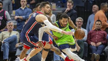 Mar 9, 2019; Minneapolis, MN, USA; Minnesota Timberwolves guard Derrick Rose (25) dribbles the ball and get fouled from Washington Wizards guard Tomas Satoransky (31) in the second half at Target Center. Mandatory Credit: Jesse Johnson-USA TODAY Sports